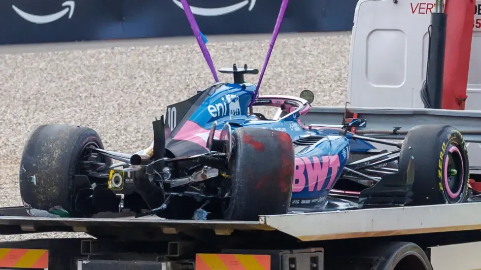 Pierre Gasly's car is taken away after crashing heavily in second practice