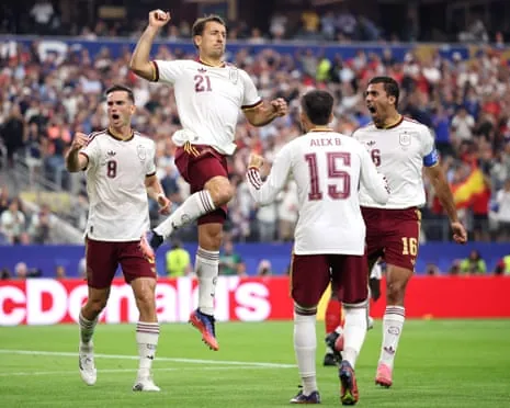 Spain players celebrate the opening goal